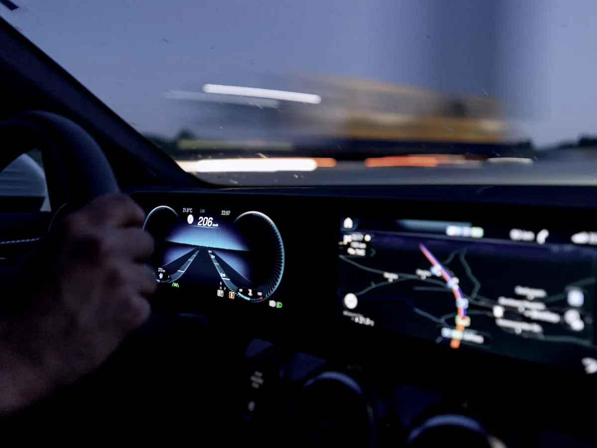 Driver's view of the cab dashboard at dusk